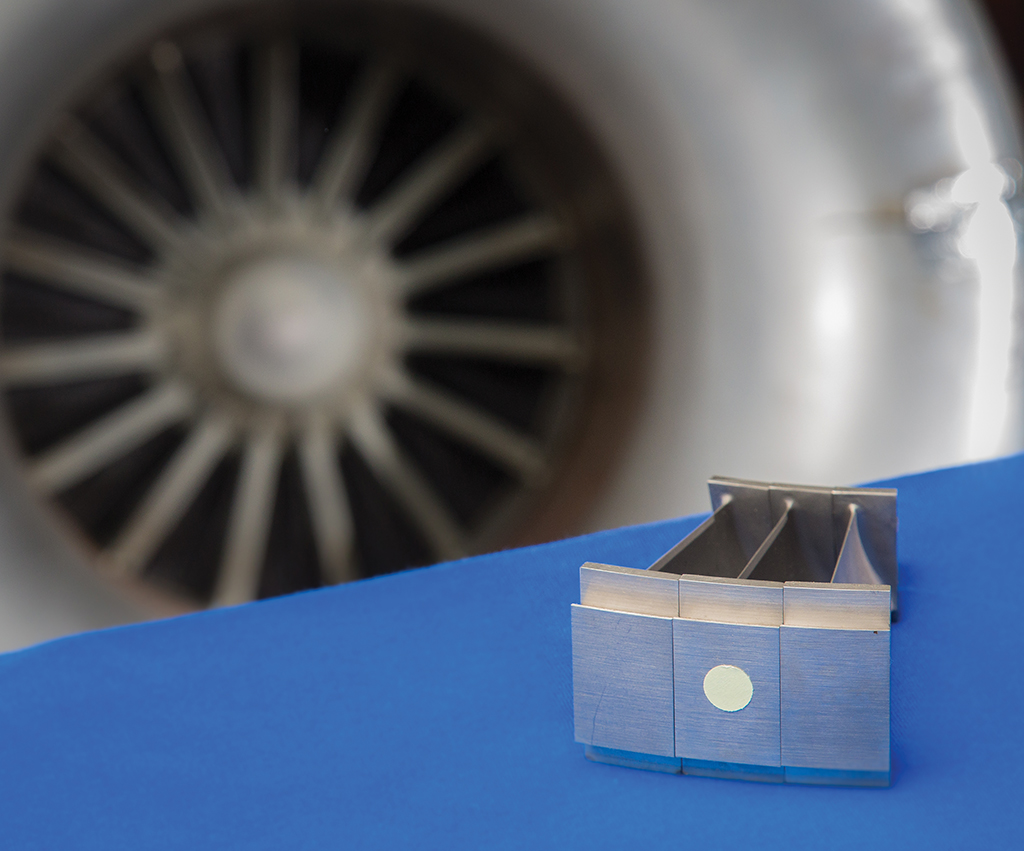 The ultrasound sensor is built into the outer surface of the engine part. Two 1-mm-dia. wires that connect to the sensor are not pictured. Credit: National Research Council of Canada.